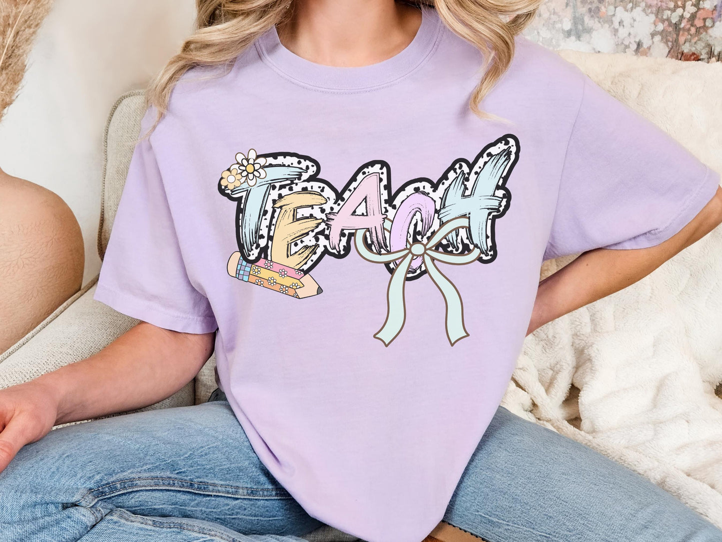 Women’s orchid teach t-shirt with the word teach in a pastel dalmation dot  print, gift for teachers