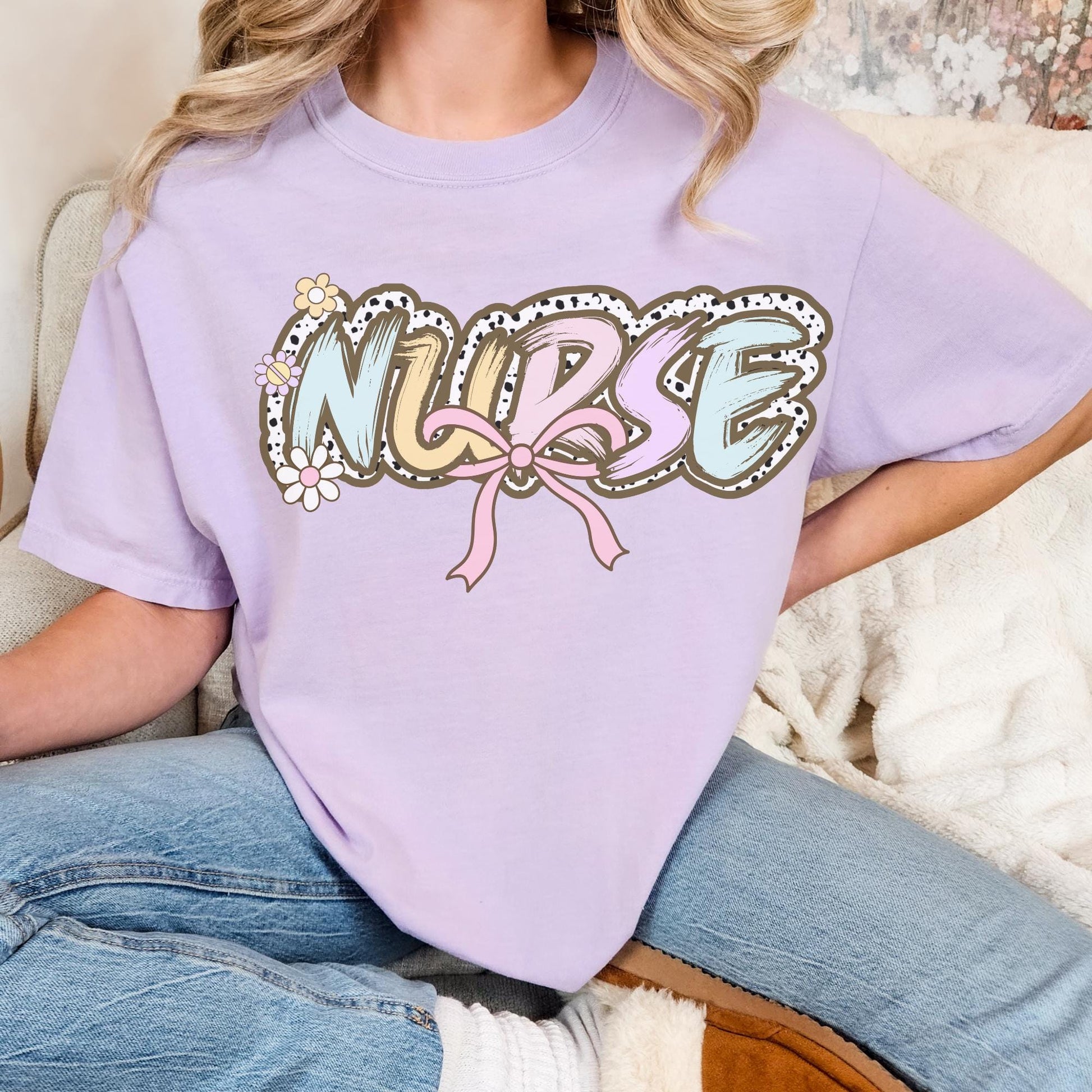 Women’s orchid nurse t-shirt with the word nurse in a pastel dalmation dot  print, gift for nurses