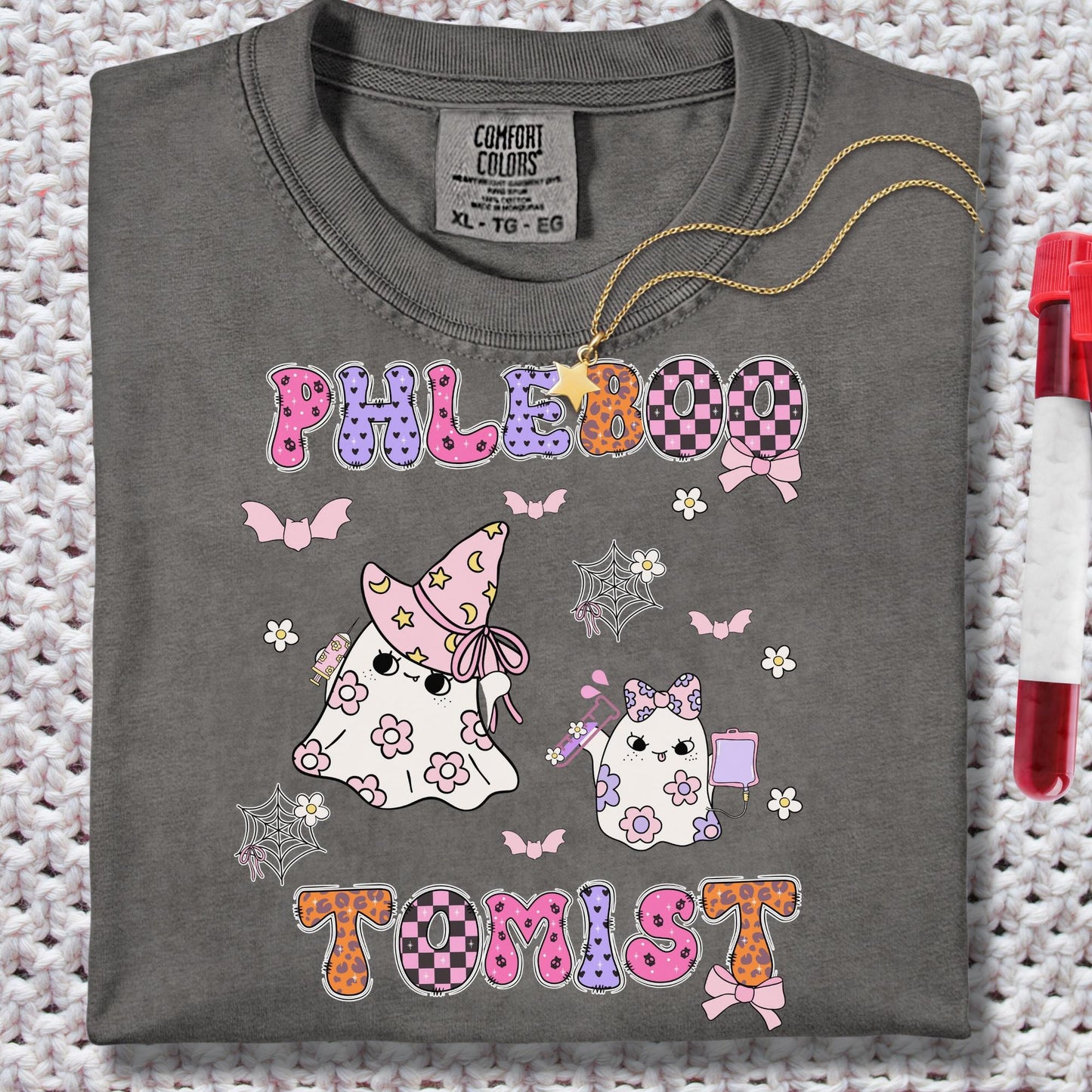 Women’s pepper grey t-shirt for phlebotomist halloween spooky cute themed for phles with the phrase phlebootomist and ghost perfect gift for phlebotomist. 