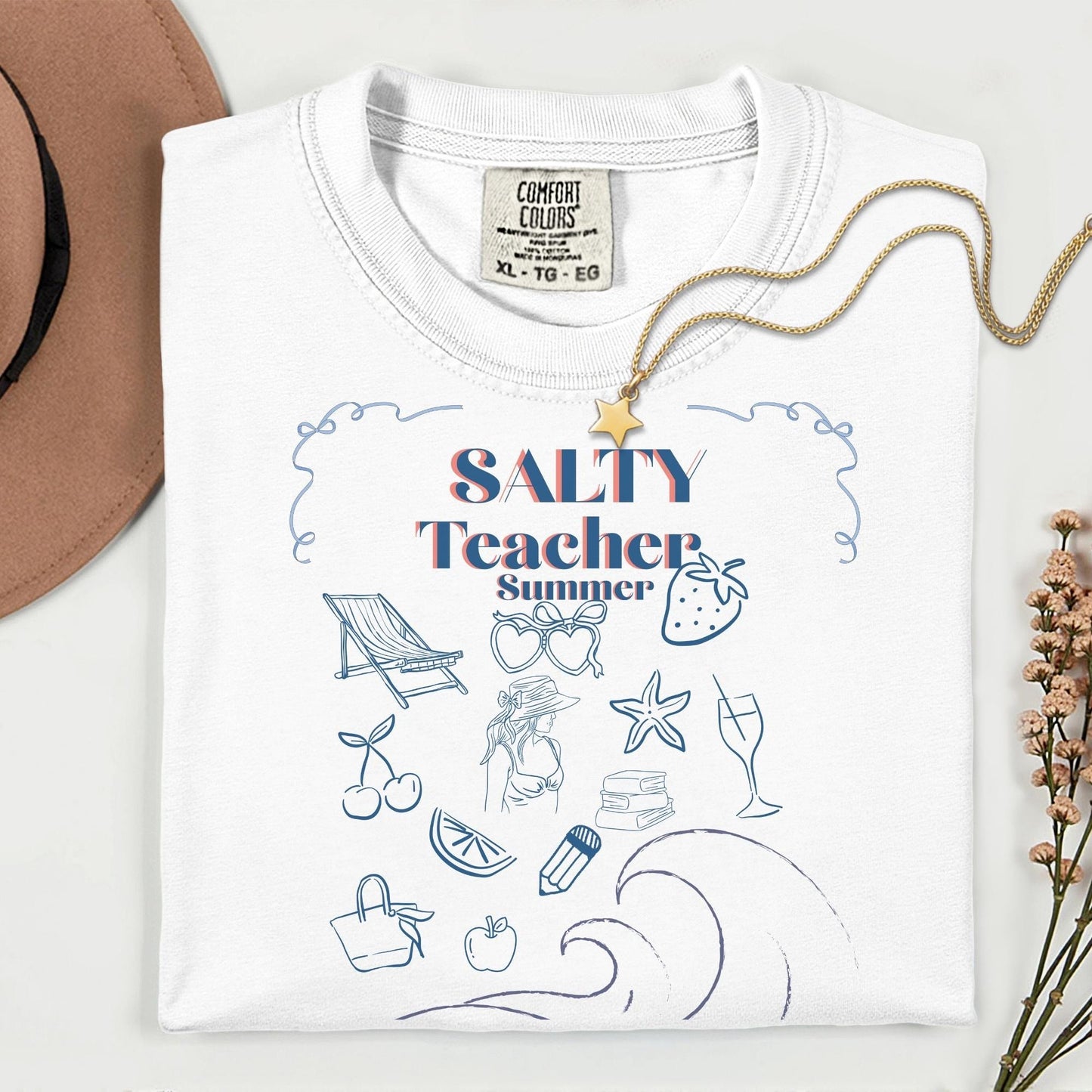 Women’s white t-shirt for teacher's summer vacation with the phrase salty teacher summer, has doodle art perfect for summer teacher trips.