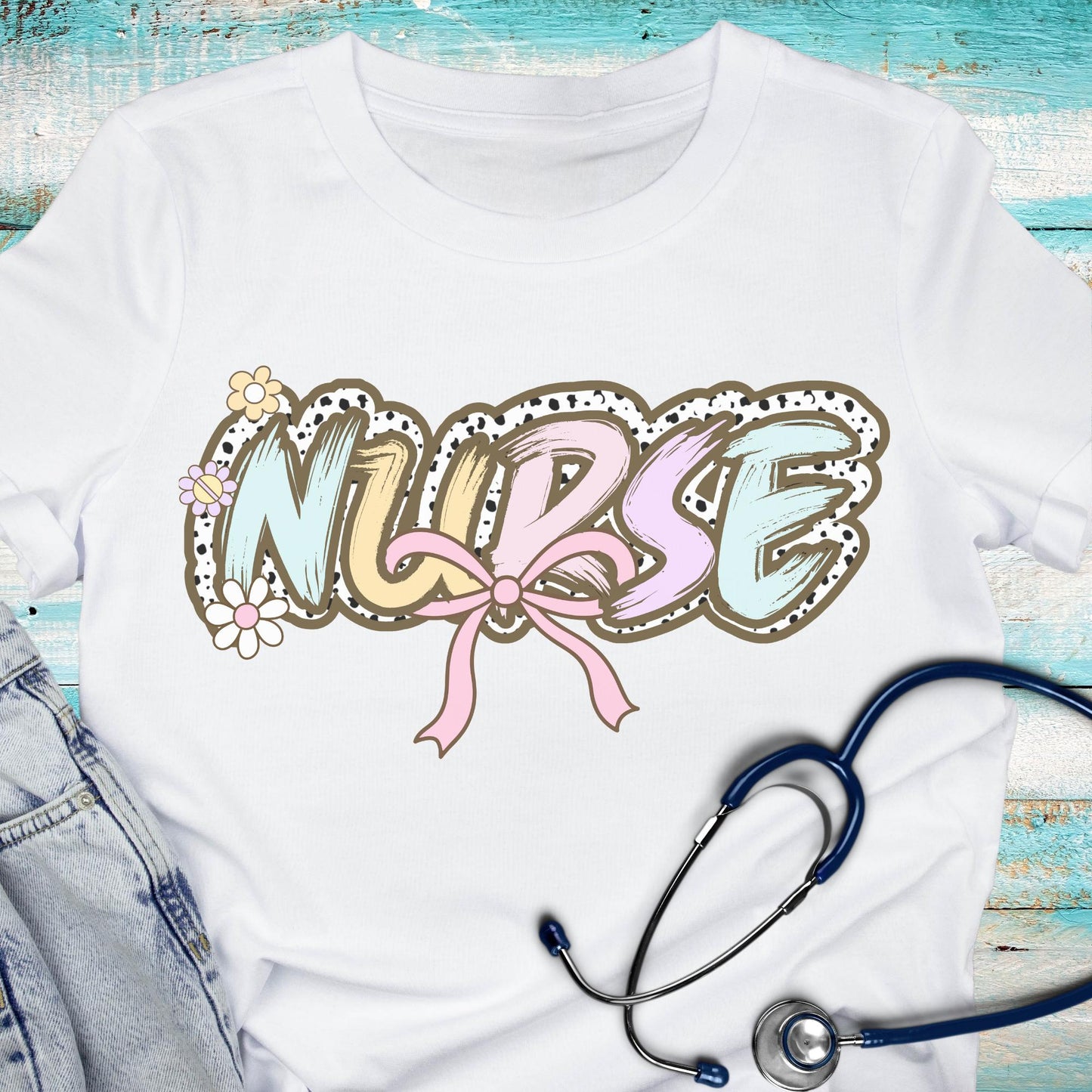 Women’s white nurse t-shirt with the word nurse in a pastel dalmation dot  print, gift for nurses