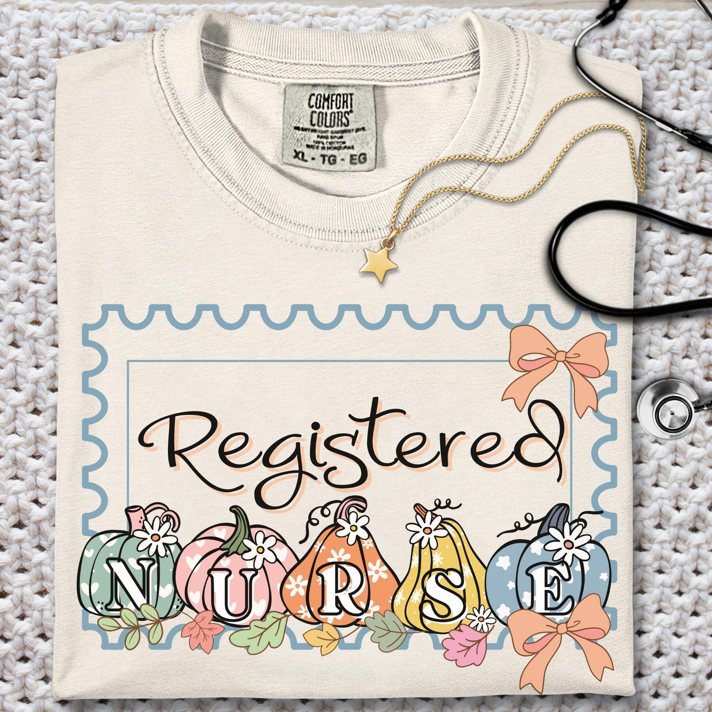 Women’s ivory t-shirt with personalized nurse fall autumn themed with pumpkins and bow floral design perfect nurse gift. 